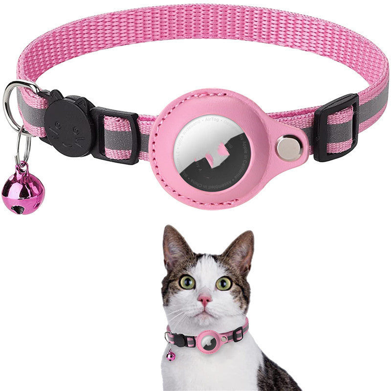 Pink and gray pet collar with a bell on a white background, featuring a cat wearing the collar, 
Mordenstore